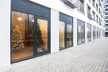 Passers-by look at the fir-tree with affection, the symbol of Christmas and New Year.